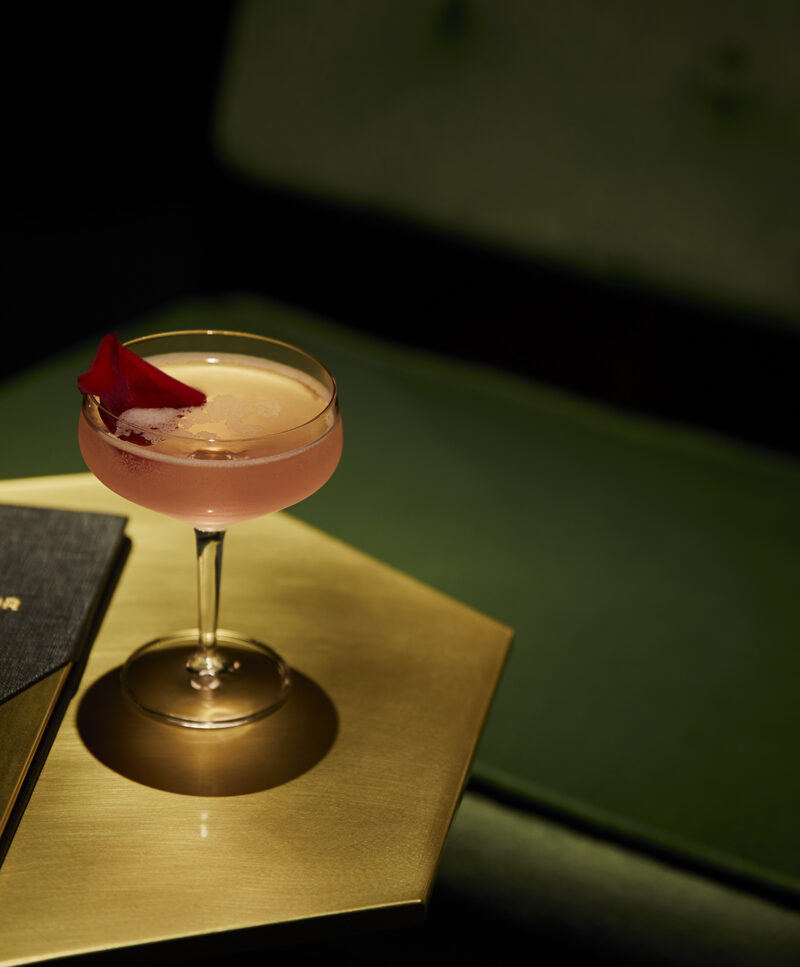 A cocktail on a table at On the Rocks bar