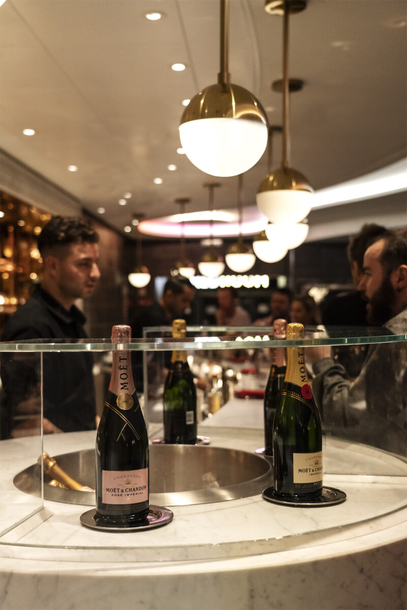 Display case of Moet & Chandon champagne at SIP Lounge