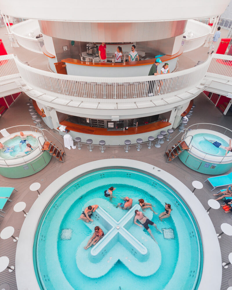 Overhead shot of people enjoying the wellbeing pool and hot tubs. (credit: @thefraserjames)